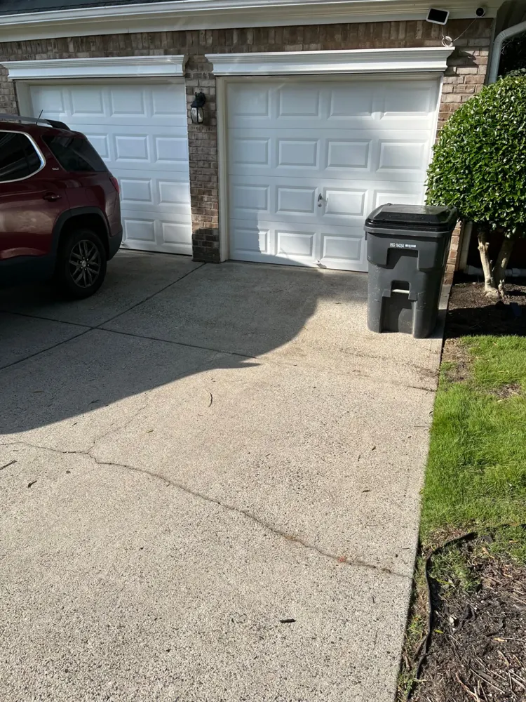 Clean driveway after junk pickup in Metro Atlanta