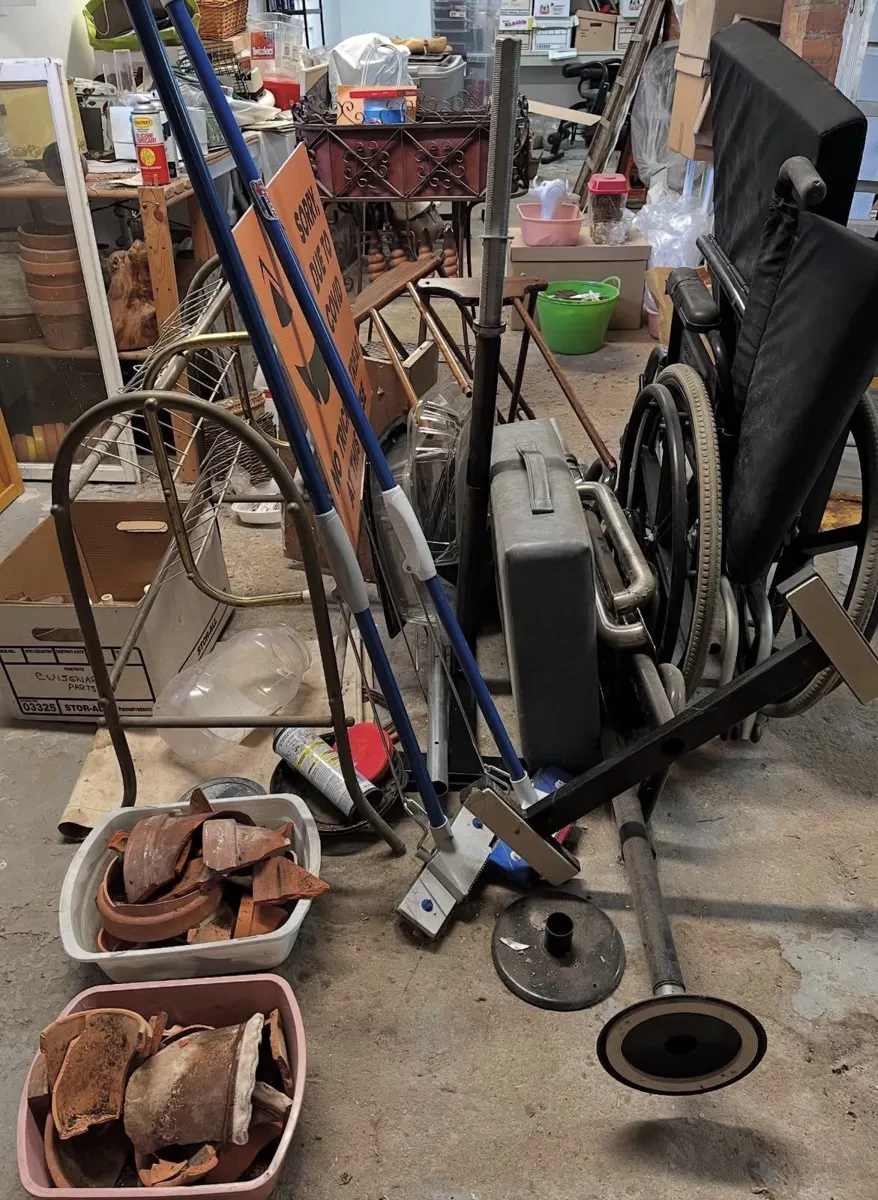 Basement packed with old equipment, pots and household items